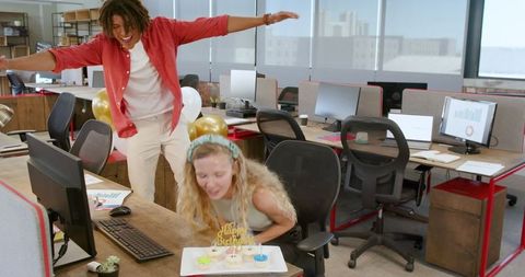 Office Birthday Celebration with Colleagues Sharing Cake