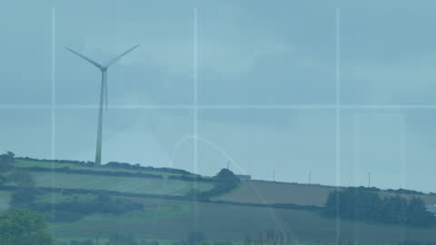 Financial Data Animation Over Wind Turbine Landscape