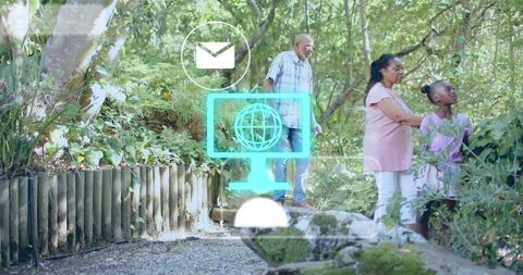 Multigenerational family strolling woodland garden with tech overlay and senior support