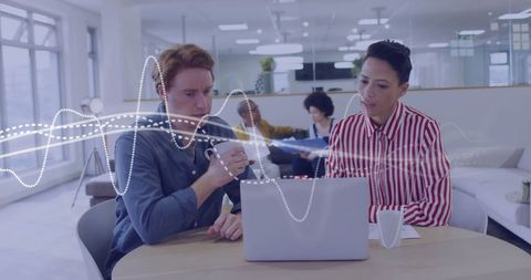 Business Professionals Collaborating with Data Visualization Overlay