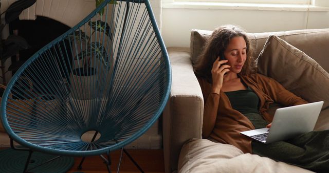 Woman Multitasking on Phone and Laptop at Home - Download Free Stock Images Pikwizard.com