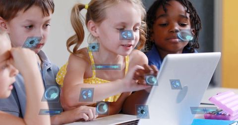 Schoolchildren engaging with virtual digital interfaces