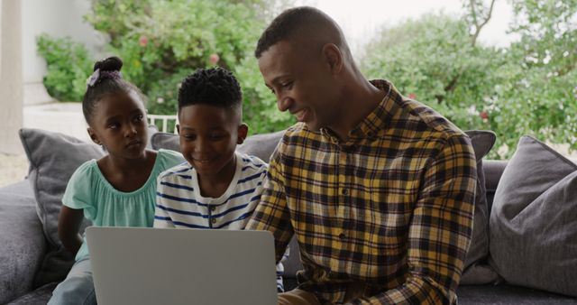 Father Spending Time with Children at Home, Smiling and Using Laptop - Download Free Stock Images Pikwizard.com