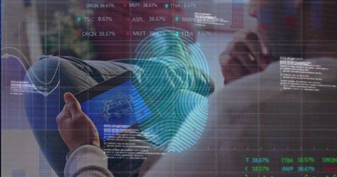 Engineer analyzing tablet with holographic fingerprint scanner