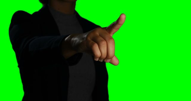 Woman Pointing Finger at Green Screen Background - Download Free Stock Images Pikwizard.com