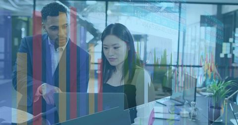 Colleagues Discussing Analytics and Strategy in Modern Office