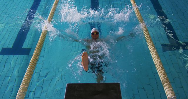 Male Swimmer Backstroke Start in Competitive Swimming Pool - Download Free Stock Images Pikwizard.com