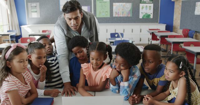 Teacher Engaging a Group of Diverse Students in Classroom Activity - Download Free Stock Images Pikwizard.com