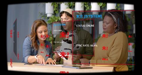 Diverse team collaborating on vr headset prototype with ar overlays in biophilic workspace