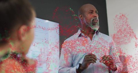 Educator presenting with digital particle visualization in modern classroom seminar