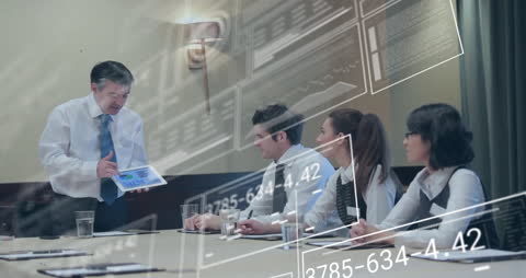 Presenting Financial Data to Business Team in Modern Office Environment