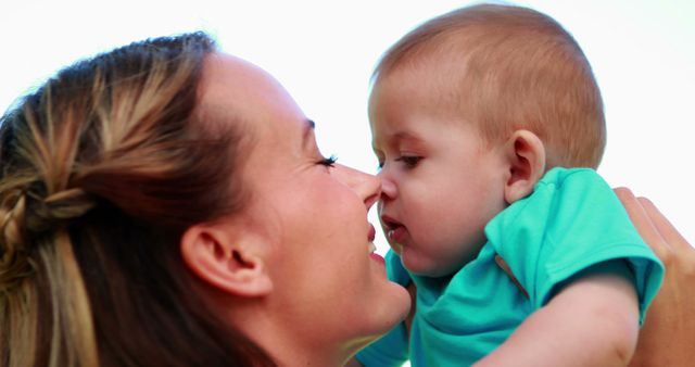 Mother Bonding with Baby in Joyful Moment - Download Free Stock Images Pikwizard.com