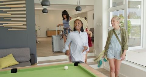 Diverse Friends on Summer Vacation in Sunny Holiday Home