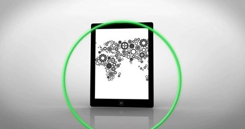 Tablet displaying gear world map with neon green ring and glossy reflection for tech concept