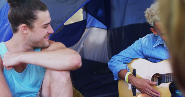 Friends Enjoying Music Inside Tent at Campsite - Download Free Stock Images Pikwizard.com