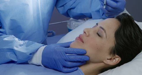 Doctor Performing Skin Assessment on Female Patient - Download Free Stock Images Pikwizard.com