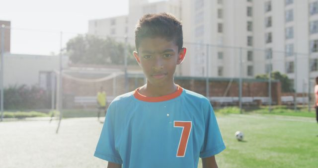 Confident Young Soccer Player in Blue Jersey - Download Free Stock Images Pikwizard.com