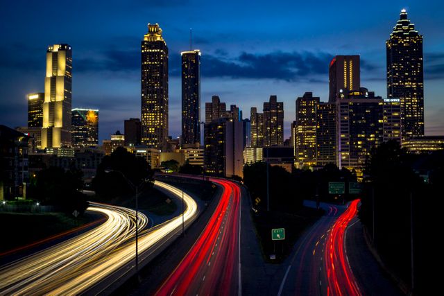 Atlanta Downtown Skyline at Dusk with Light Trails from Traffic - Download Free Stock Photos Pikwizard.com