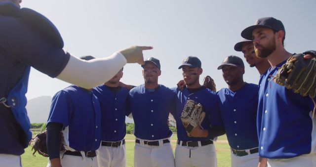 Baseball team gathering during game with coach giving directions - Download Free Stock Images Pikwizard.com