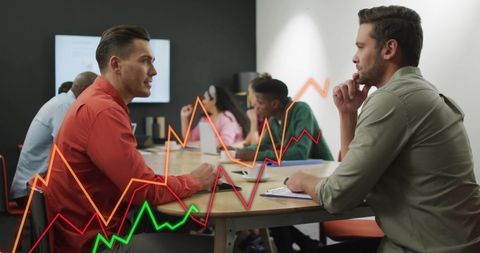 Business Professionals Analyzing Digital Financial Data in Office Setting