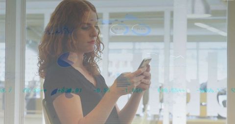 Professional Woman Analyzing Data on Smartphone in Modern Office