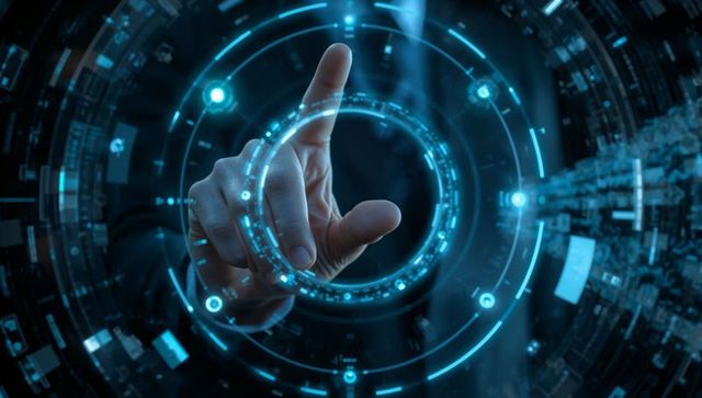 Hand touching futuristic holographic interface with glowing cyan data rings