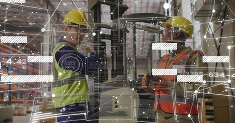 African American and Asian Workers Using AR to Inspect Forklift for Smart Warehouse Safety