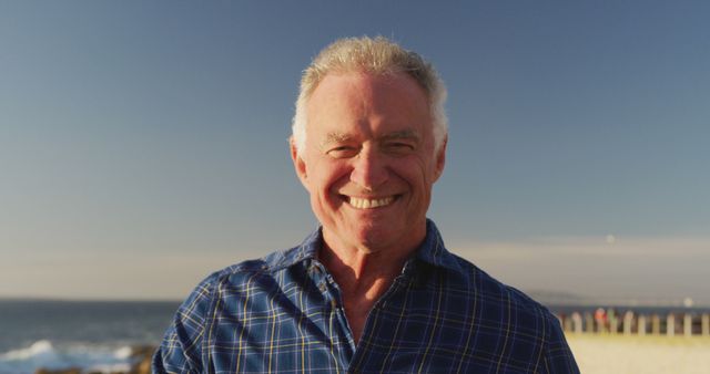 Happy Senior Man Smiling Outdoors by the Beach - Download Free Stock Images Pikwizard.com