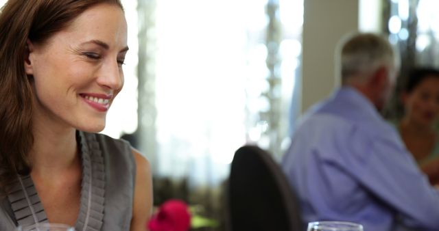 Smiling Woman Enjoying Lunch at Elegant Restaurant - Download Free Stock Images Pikwizard.com