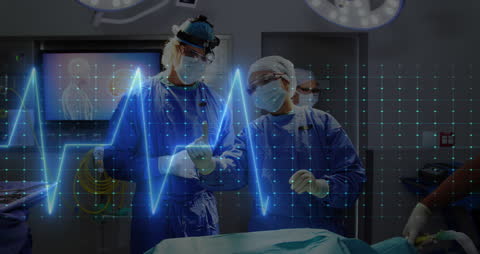 Surgeons Collaborating in Operating Room with Digital Interface