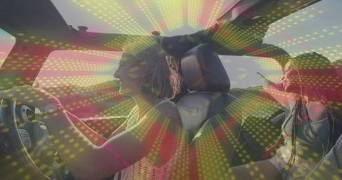 Friends Enjoying Scenic Convertible Drive