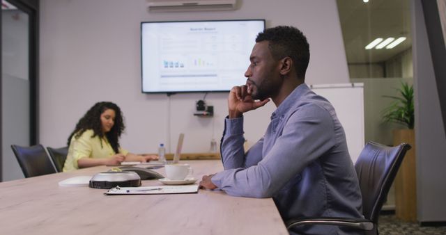 Business professionals in meeting room analyzing data on screen - Download Free Stock Images Pikwizard.com