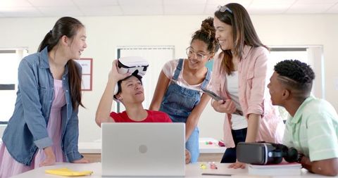 Diverse Students Engaging with VR Technology in Classroom