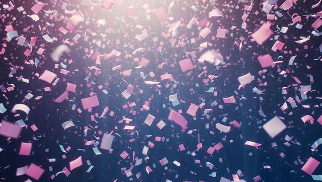 Vibrant Pastel Pink and White Confetti in Motion