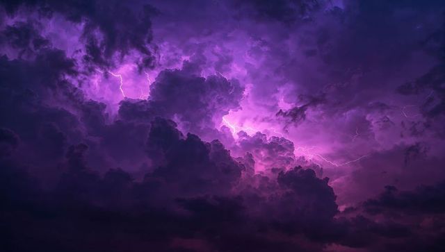 Dynamic Purple Storm Clouds Illuminated by Lightning Bolts