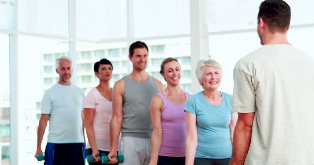 Group Fitness Class with Mixed Age Participants Exercising Together - Download Free Stock Images Pikwizard.com