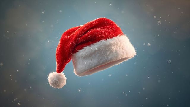 Floating red santa hat with snowflakes on blue bokeh background festive holiday