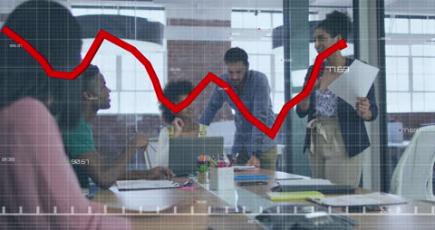 Collaborative Office Team Analyzing Data with Graph Overlay