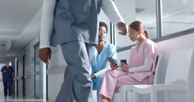 Hospital Staff Taking a Break in Hallway - Download Free Stock Images Pikwizard.com