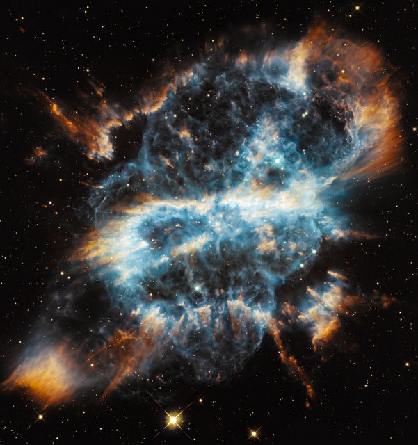'Tis the season for holiday decorating and tree-trimming. Not to be left out, astronomers using NASA's Hubble Space Telescope have photographed a festive-looking nearby planetary nebula called NGC 5189. The intricate structure of this bright gaseous nebula resembles a glass-blown holiday ornament with a glowing ribbon entwined.  Planetary nebulae represent the final brief stage in the life of a medium-sized star like our sun. While consuming the last of the fuel in its core, the dying star expels a large portion of its outer envelope. This material then becomes heated by the radiation from the stellar remnant and radiates, producing glowing clouds of gas that can show complex structures, as the ejection of mass from the star is uneven in both time and direction. To read more go to: <a href="http://www.nasa.gov/mission_pages/hubble/science/ngc5189.html" rel="nofollow">www.nasa.gov/mission_pages/hubble/science/ngc5189.html</a>  Credit: NASA, ESA, and G. Bacon (STScI)  <b><a href="http://www.nasa.gov/audience/formedia/features/MP_Photo_Guidelines.html" rel="nofollow">NASA image use policy.</a></b>  <b><a href="http://www.nasa.gov/centers/goddard/home/index.html" rel="nofollow">NASA Goddard Space Flight Center</a></b> enables NASA’s mission through four scientific endeavors: Earth Science, Heliophysics, Solar System Exploration, and Astrophysics. Goddard plays a leading role in NASA’s accomplishments by contributing compelling scientific knowledge to advance the Agency’s mission.  <b>Follow us on <a href="http://twitter.com/NASA_GoddardPix" rel="nofollow">Twitter</a></b>  <b>Like us on <a href="http://www.facebook.com/pages/Greenbelt-MD/NASA-Goddard/395013845897?ref=tsd" rel="nofollow">Facebook</a></b>  <b>Find us on <a href="http://instagrid.me/nasagoddard/?vm=grid" rel="nofollow">Instagram</a></b>