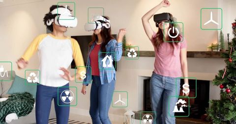Friends wearing vr headsets in cozy living room interacting with floating ar energy icons