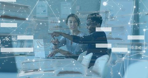 Female professionals collaborating and analyzing laptop data with futuristic digital overlay