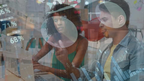 Young Professionals Analyzing Financial Data Collaboratively