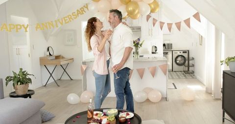 Mature Couple Celebrating Anniversary in Cozy Home Setting