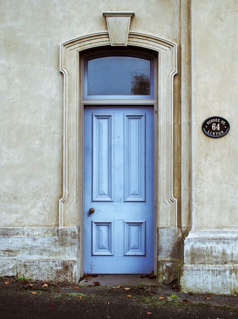 Closed Blue Wooden Door with Vintage Architecture - Download Free Stock Photos Pikwizard.com