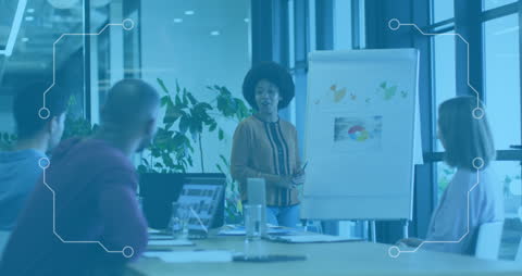 Diverse Team Engaged in Corporate Data Presentation