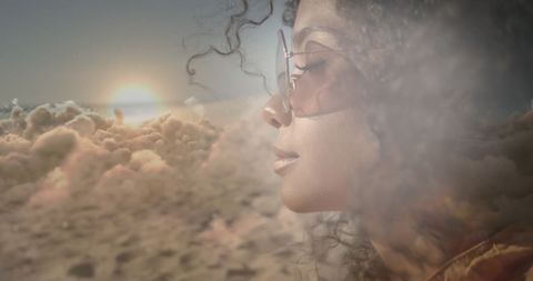 Serene afro-american woman reflects at dreamy seashore sunset