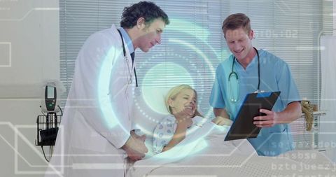 Medical team examining smiling patient using augmented reality hud and electronic chart