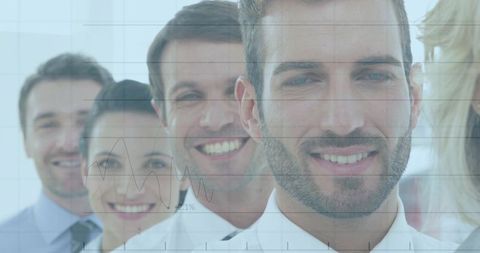 Bearded leader standing front of smiling corporate team with analytics grid overlay