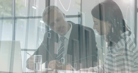 Business Partnership Analyzing Data in Contemporary Office